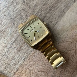 Nixon Men’s gold watch